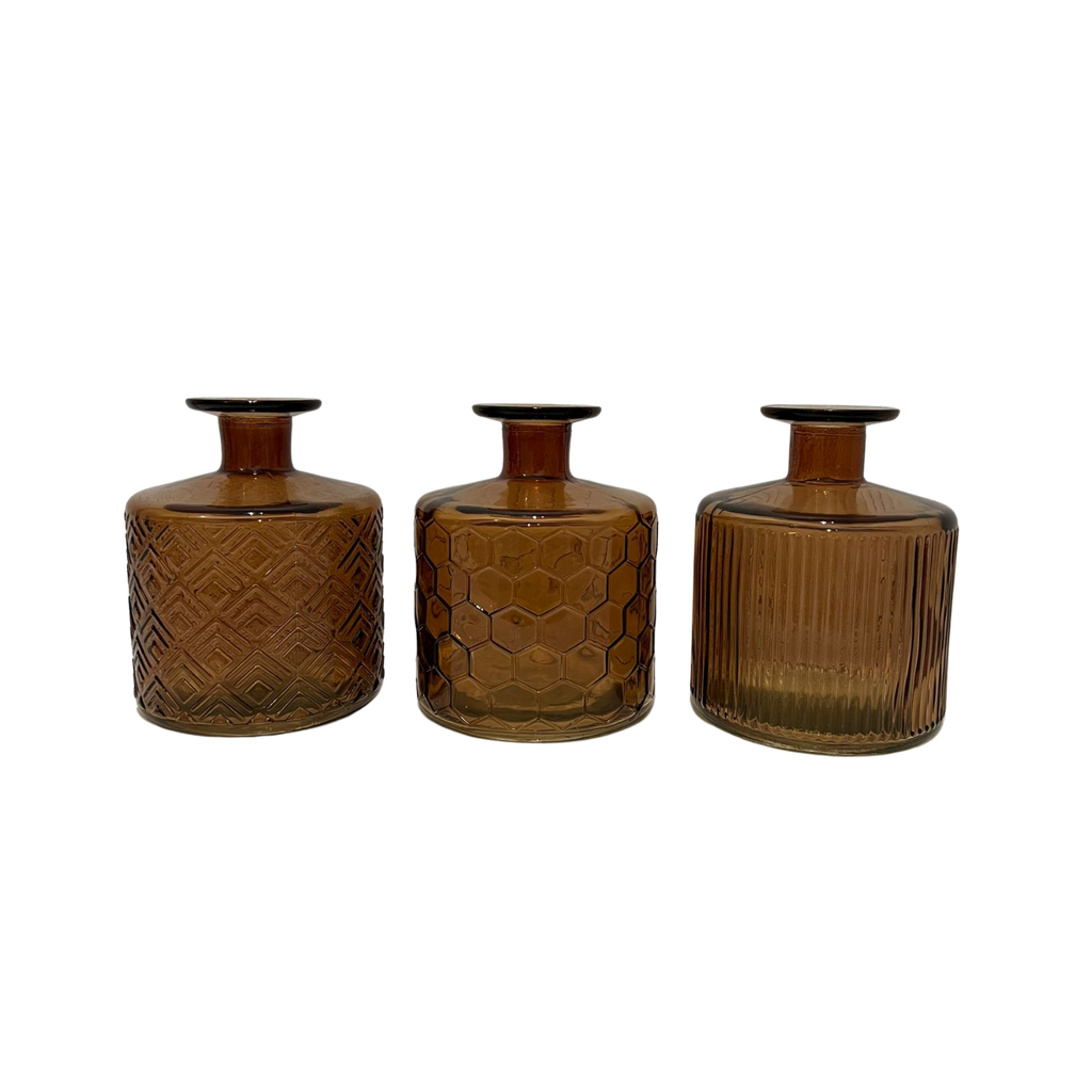 Vases en verre brun clair dépareillés trio